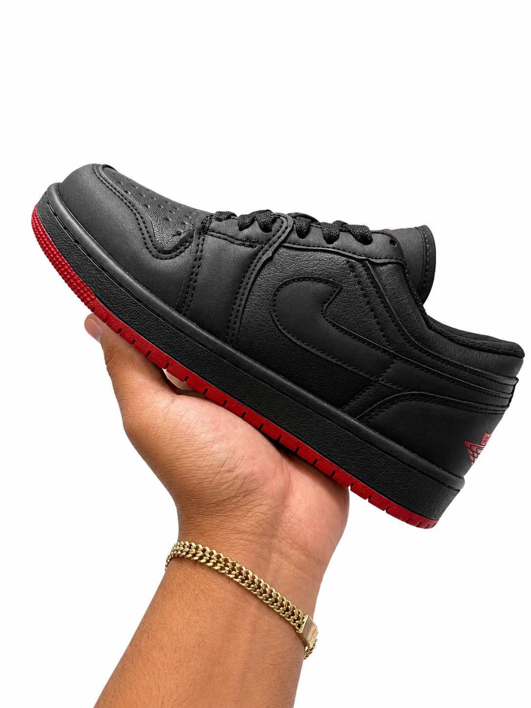JORDAN 1 LOW NEGRO ROJO