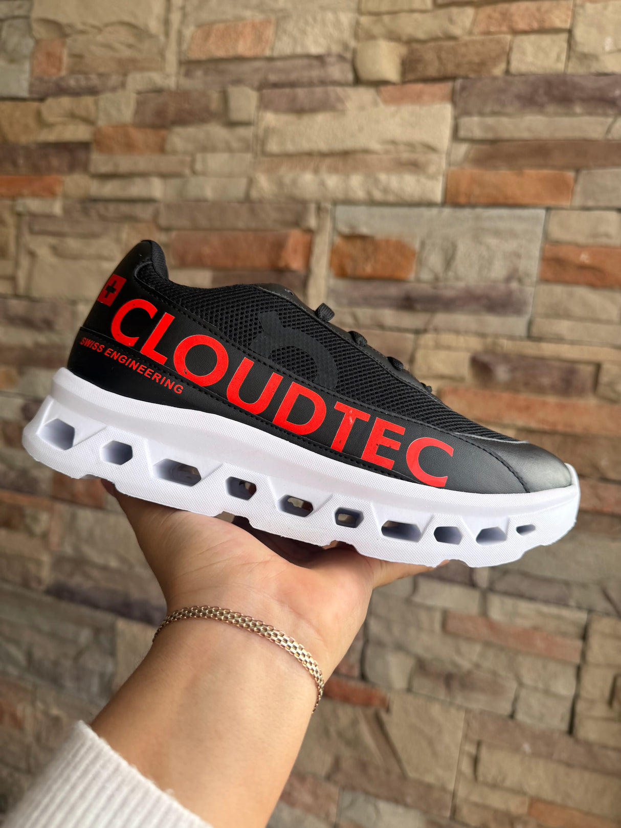ON CLOUD NEGRO NARANJA_